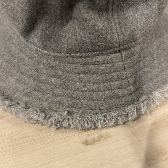 Hat attack NWT Frayed Edge Bucket Hat in light Grey in a Polyester/ Rayon blend.